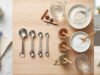 How Much Is a Teaspoon? Size, Appearance and Measuring Guide Kitchen measuring spoons with flour, sugar, spices and liquid ingredients